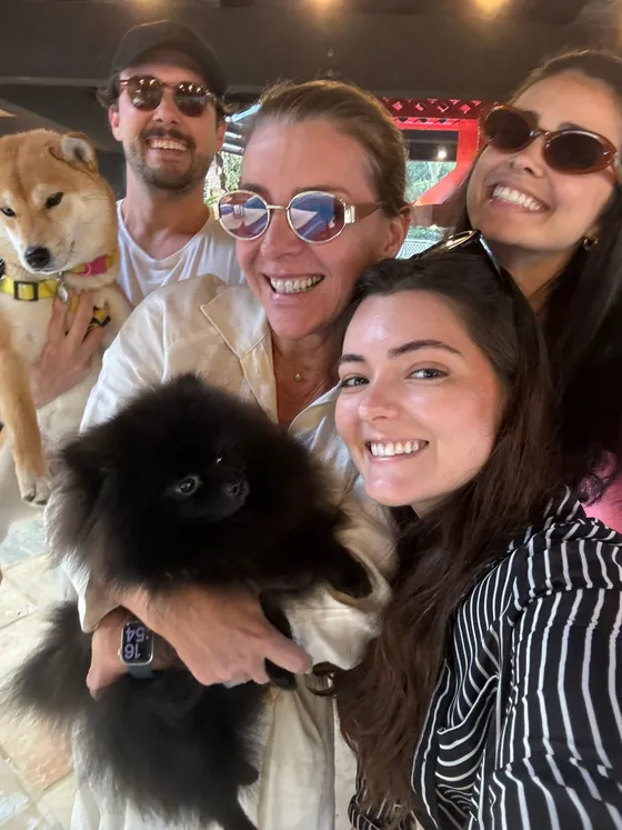Augusto with family and dogs